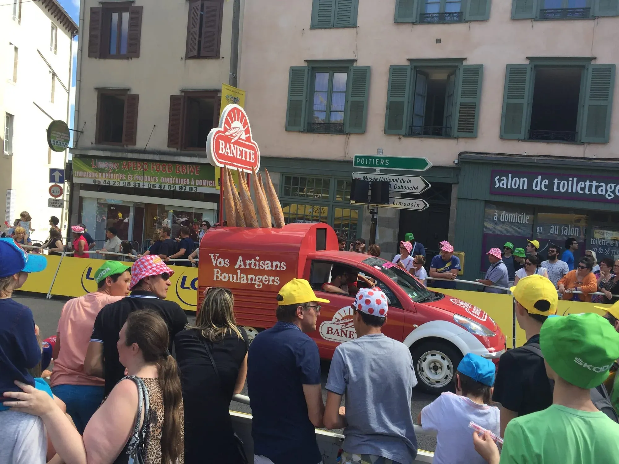 Red Banette bakery promotional vehicle in Tour de France spectator crowd