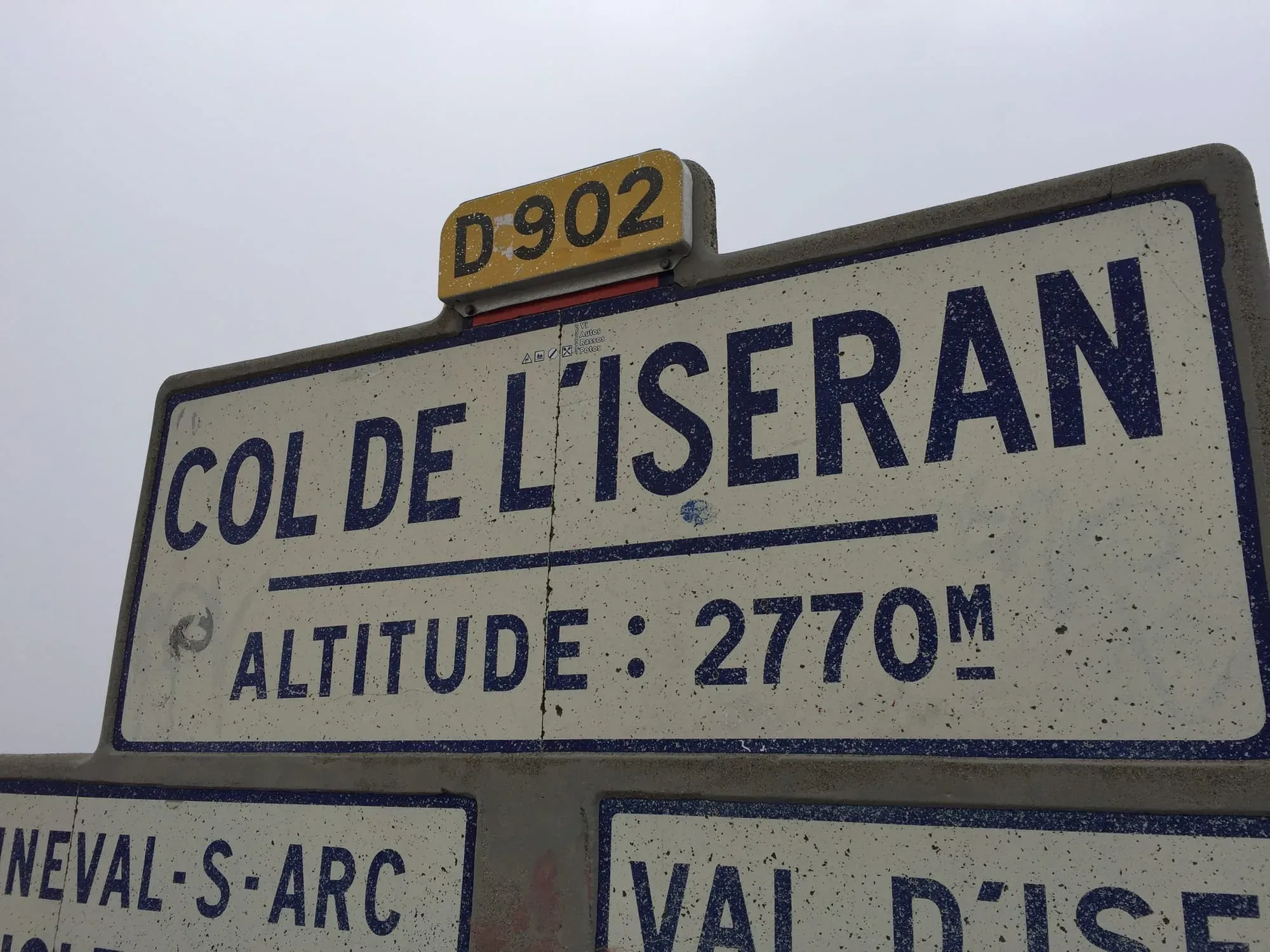 Road sign for Col de l'Iseran mountain pass at 2770m altitude