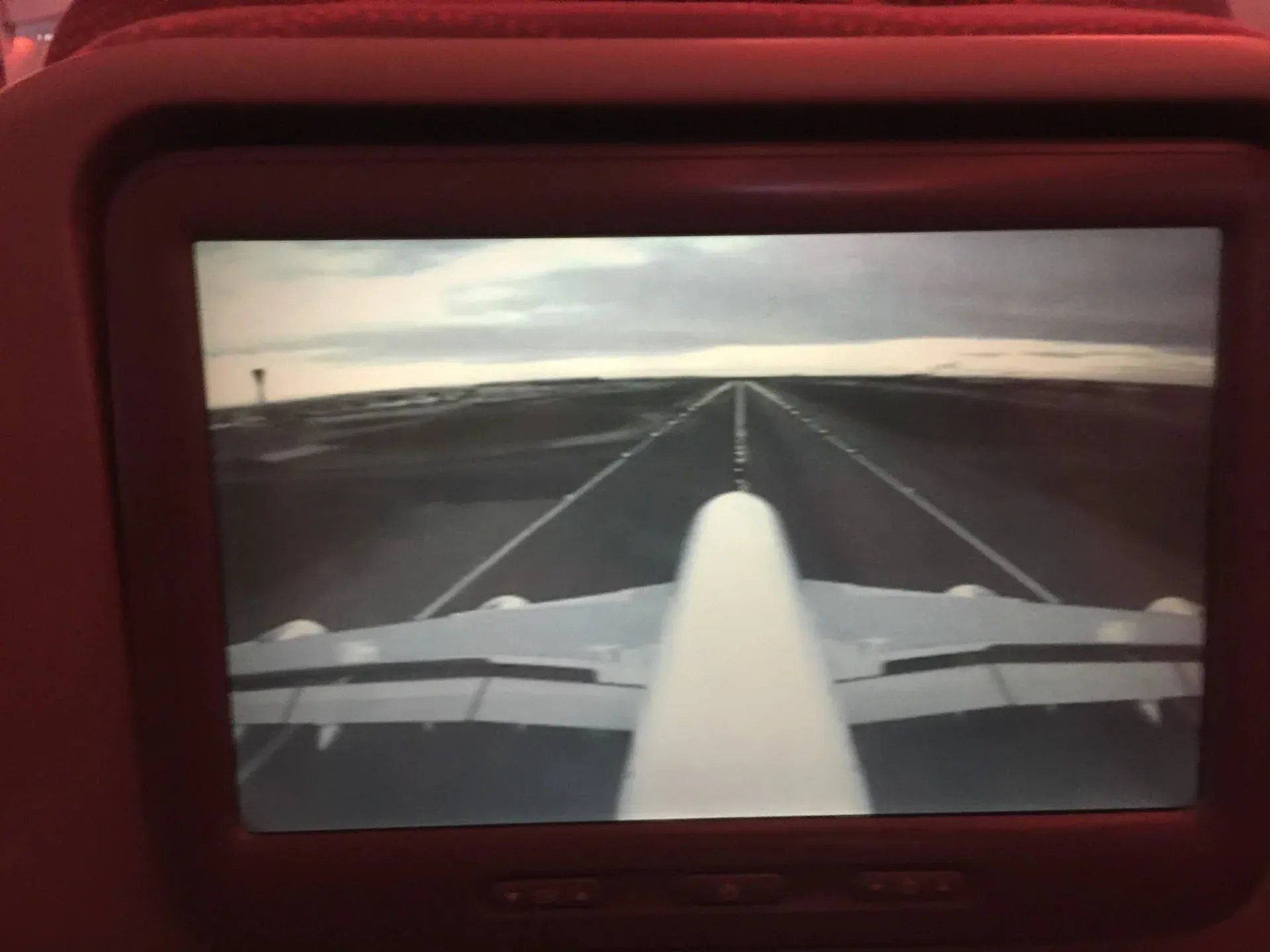 Cockpit view of small plane on runway