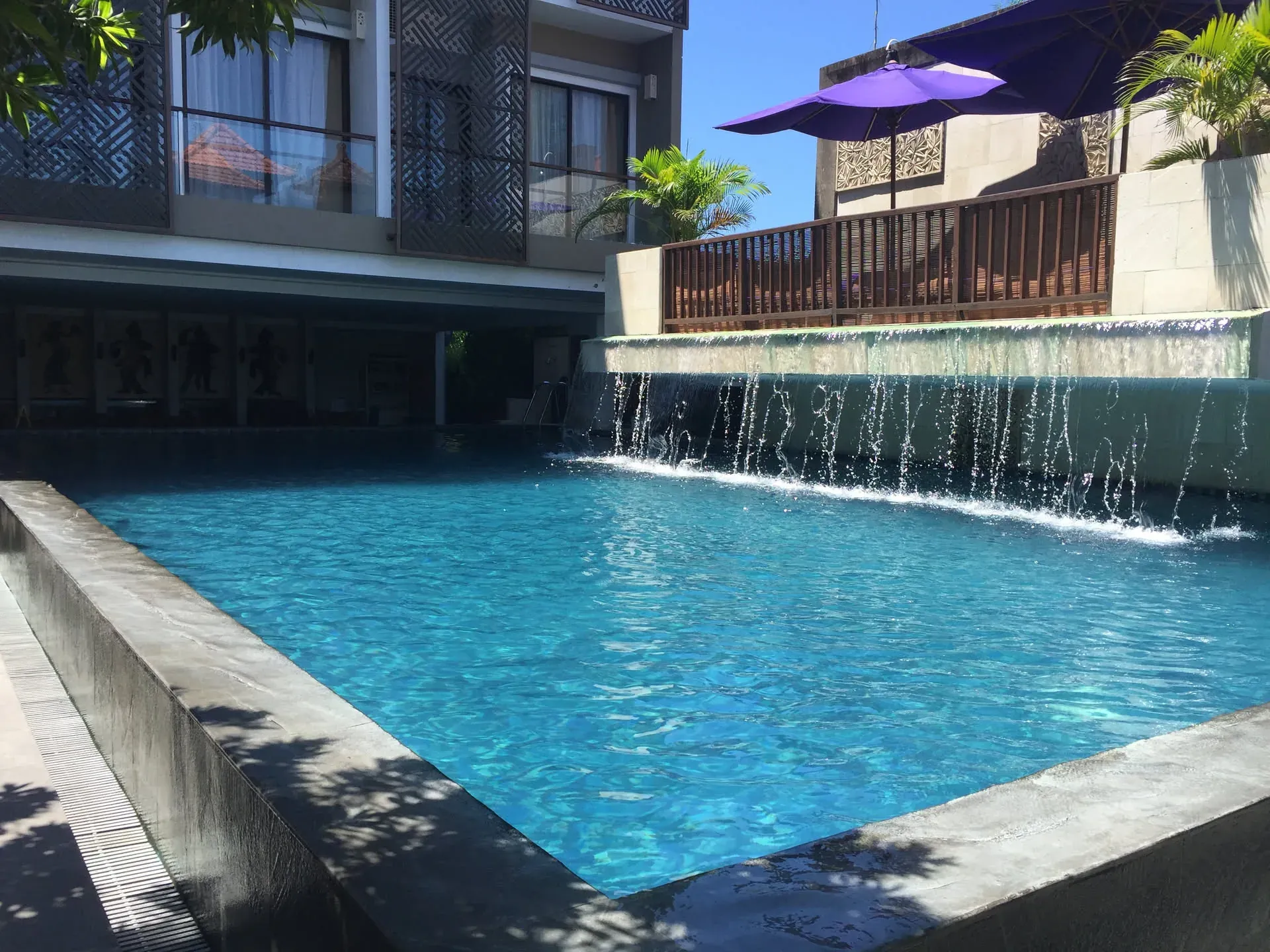 Pool with waterfall at Seminyak villa, Bali