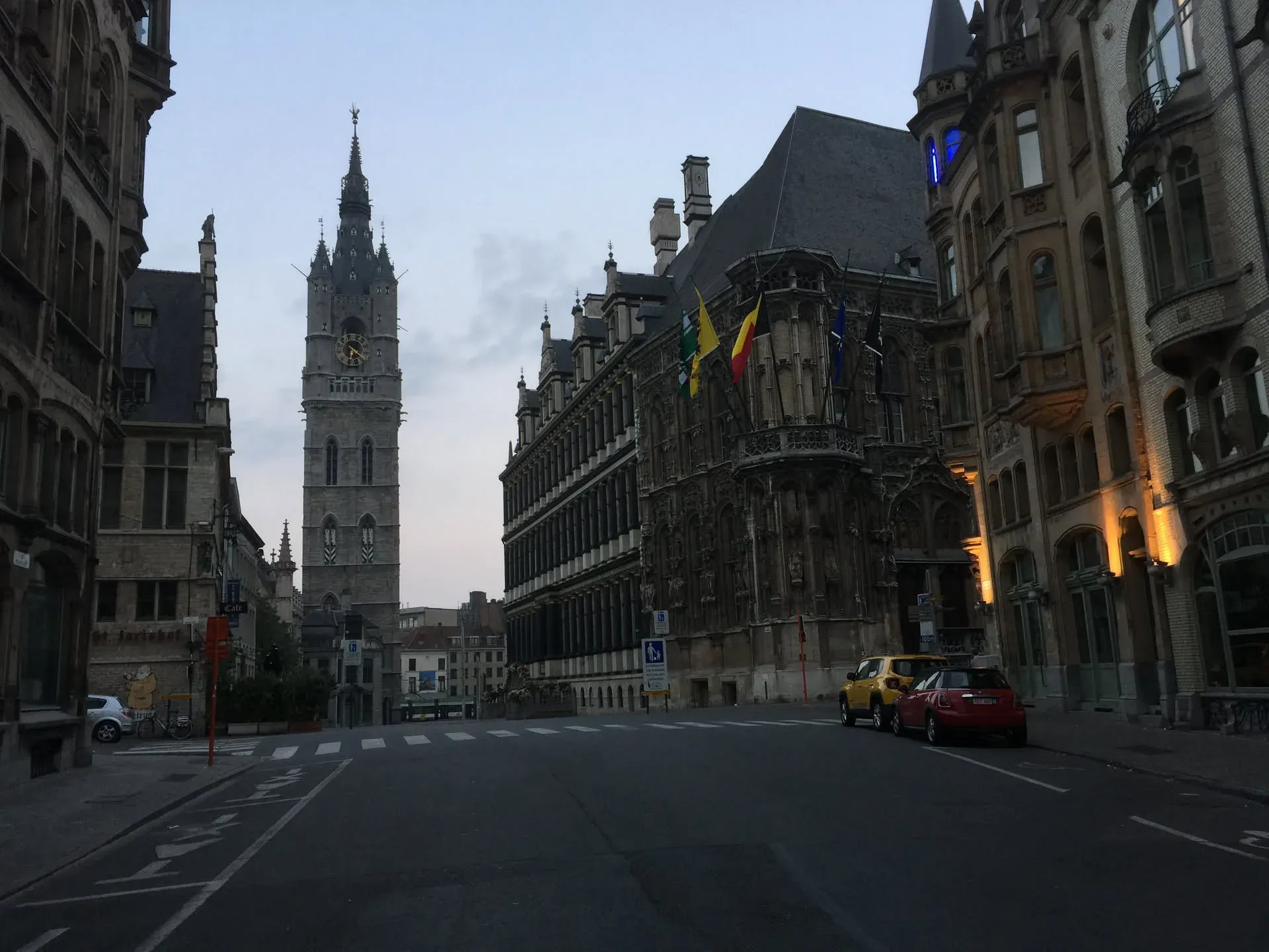 Medieval bell tower in Ghent's city center at dusk