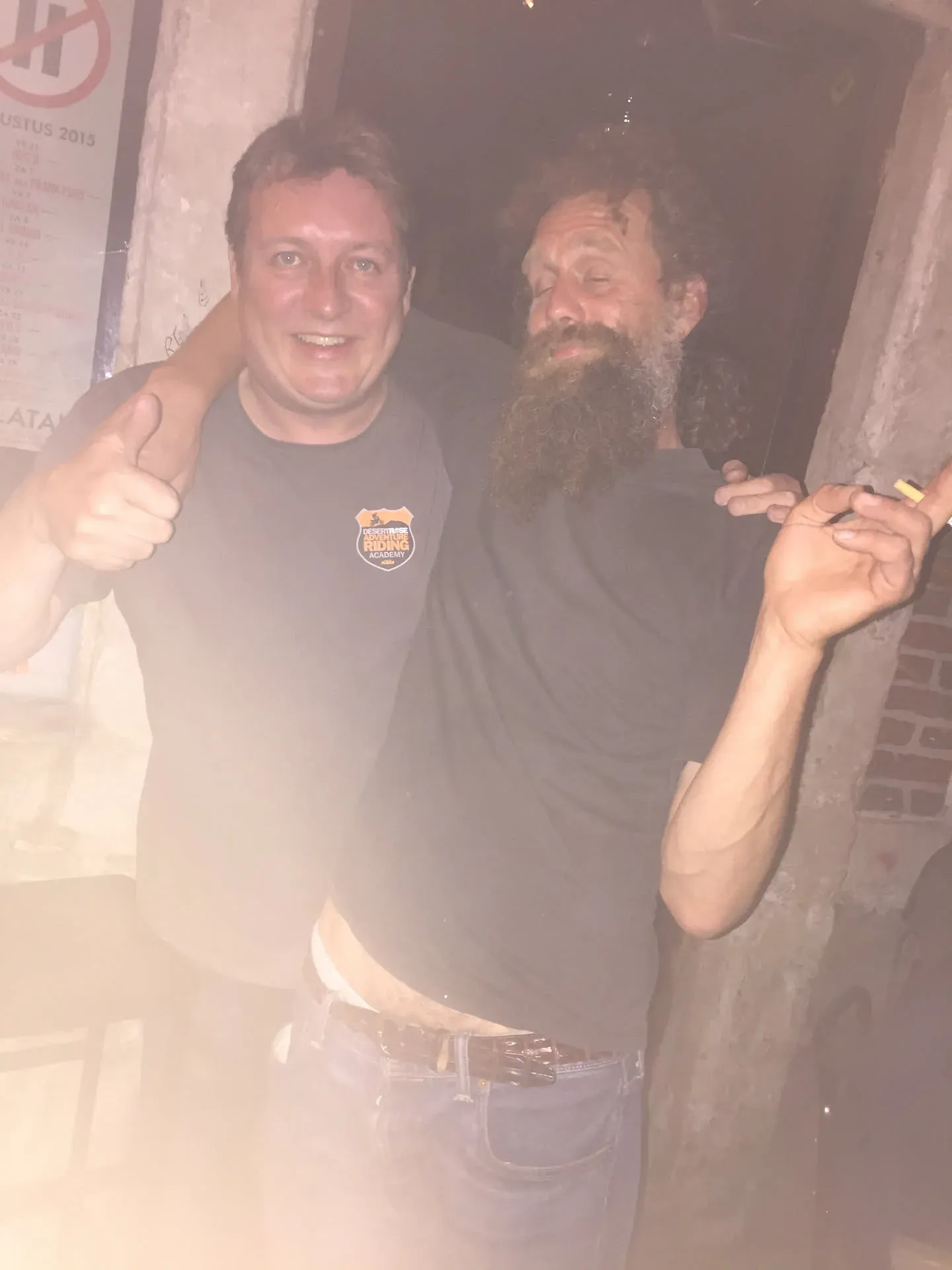 Two men posing at Ghent venue, 2015