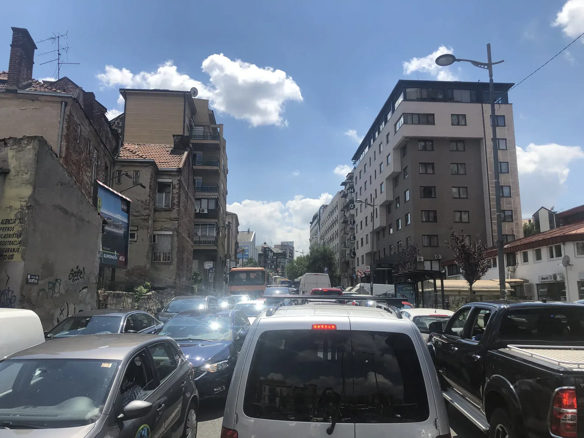 Parked cars on busy street in Palilula, Serbia