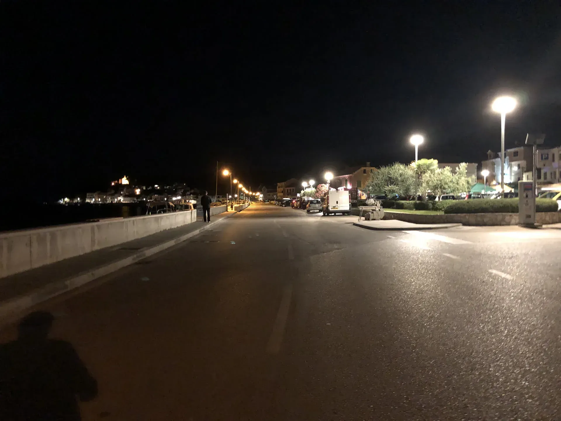Waterfront promenade at night in Tisno, Croatia