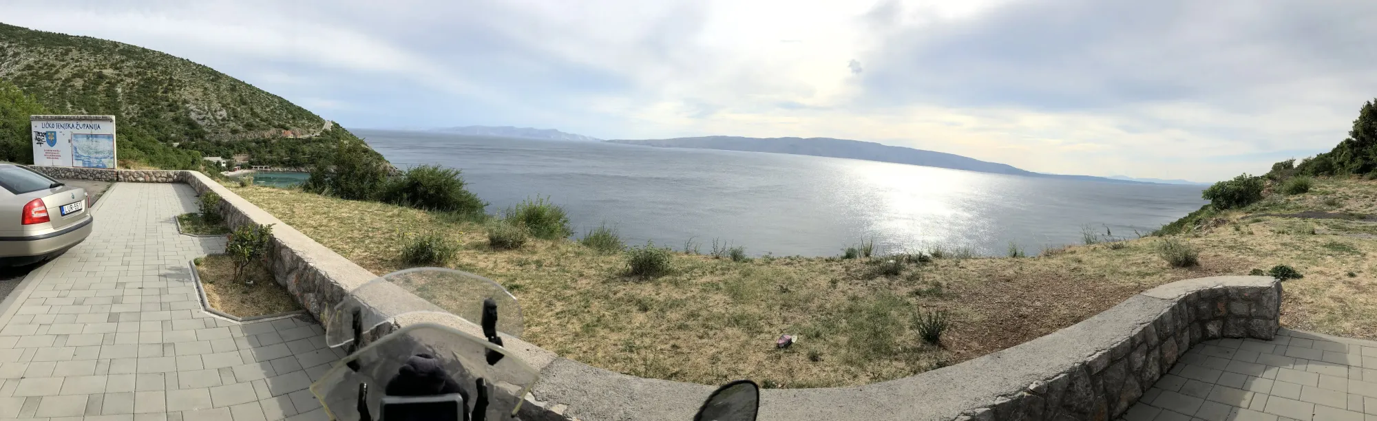 Motorcycle parked at Batina, Croatia coastal viewpoint