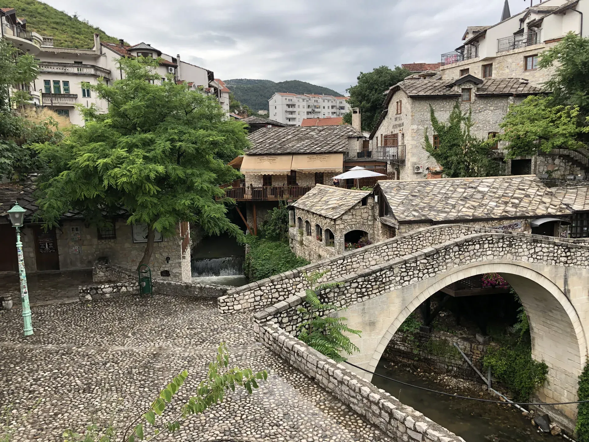 Stone bridge over river in Mostar's old town