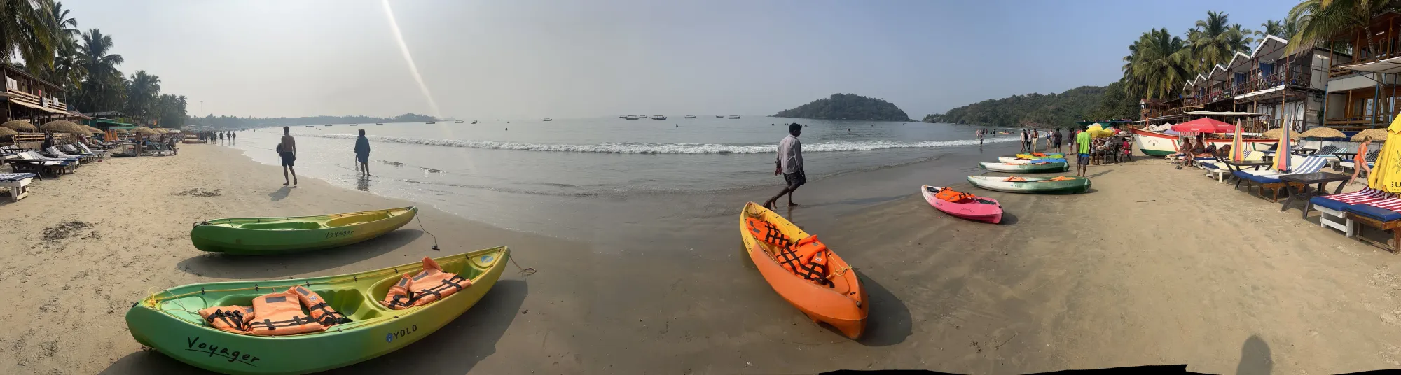 Colorful kayaks beached at Devabag