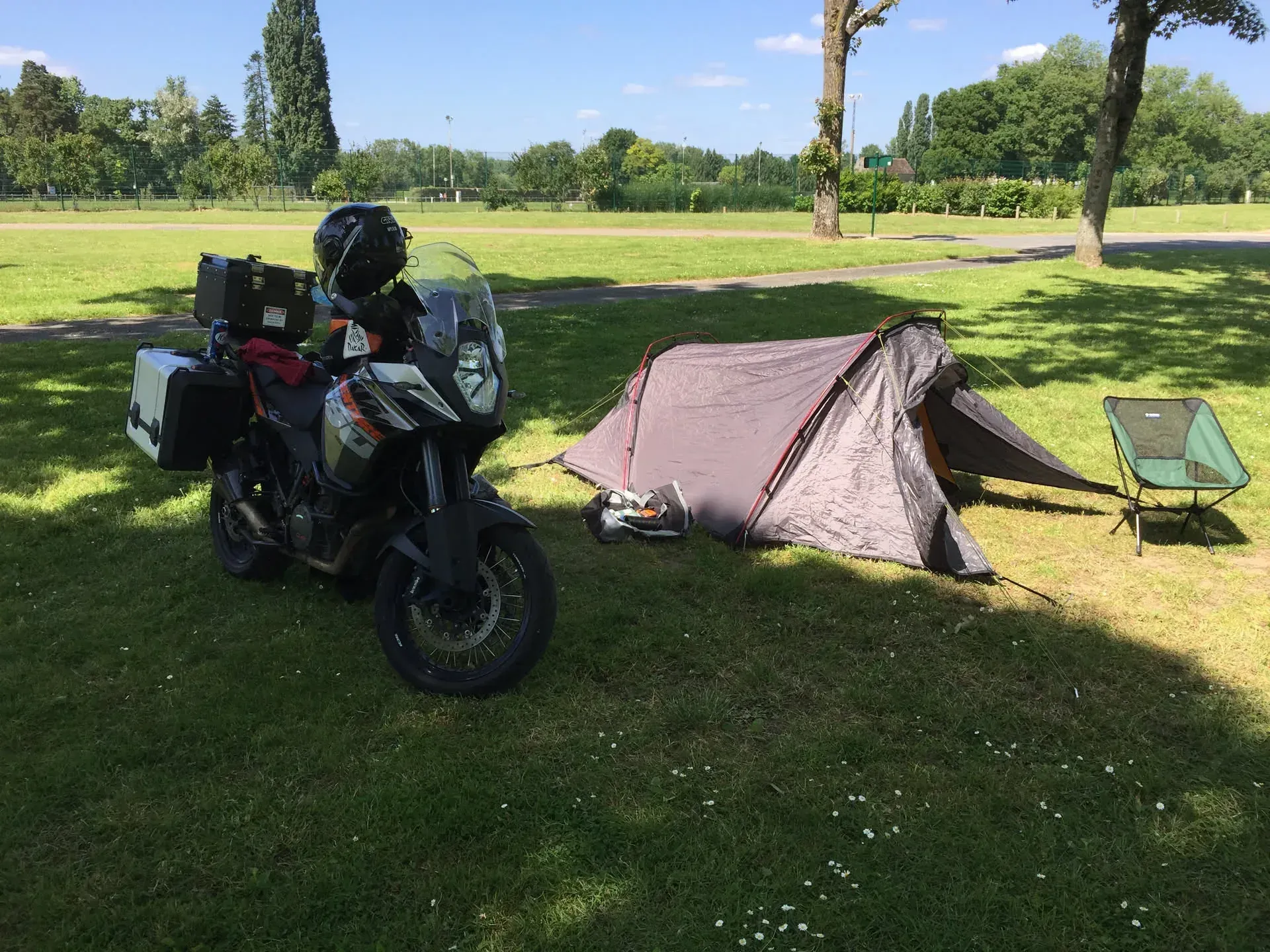 Motorcycle camping setup at La Ville-Sud park