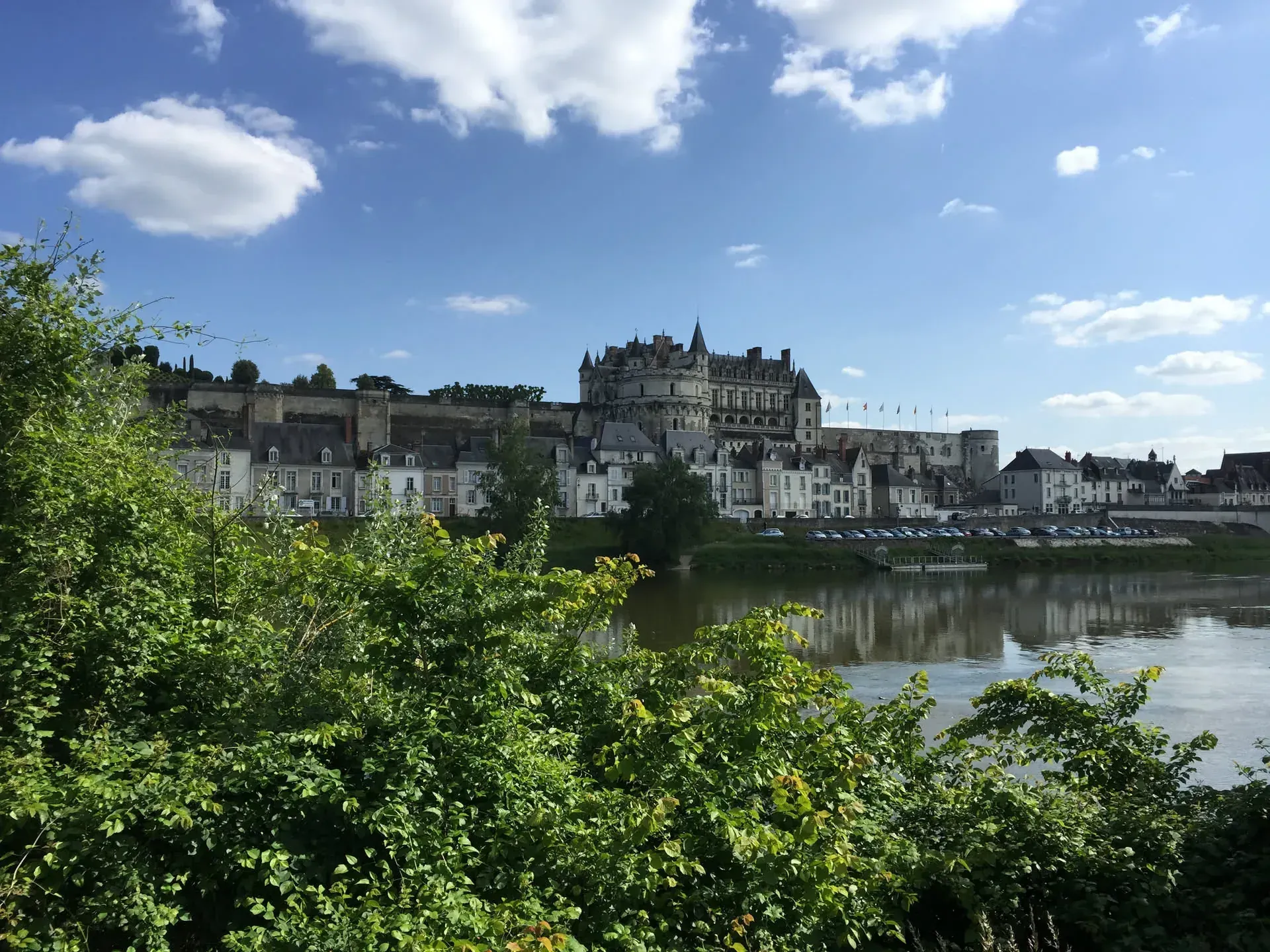 Medieval castle reflected in river at Amboise