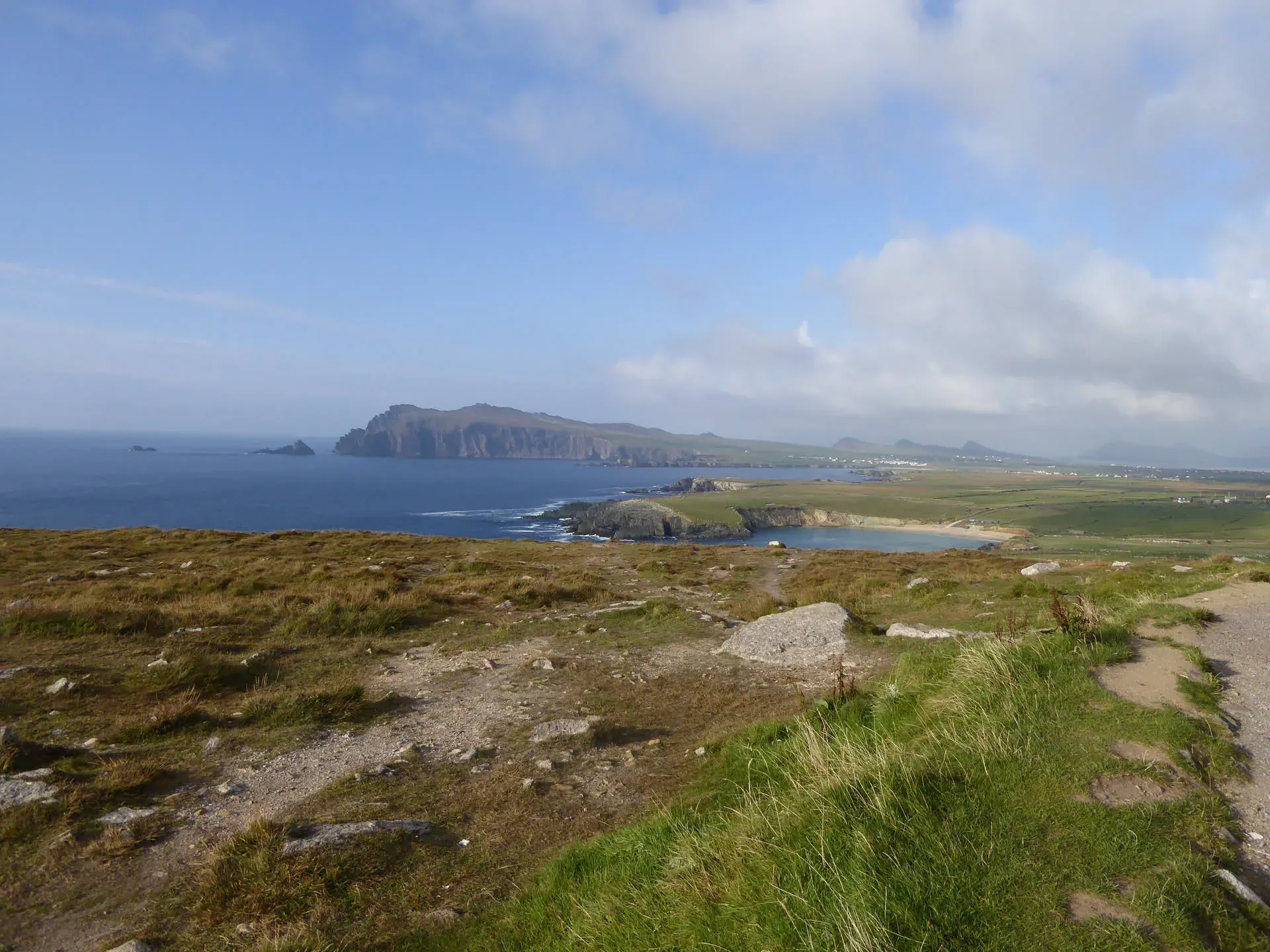Coastal cliffs and green fields at Dunurlin, Ireland