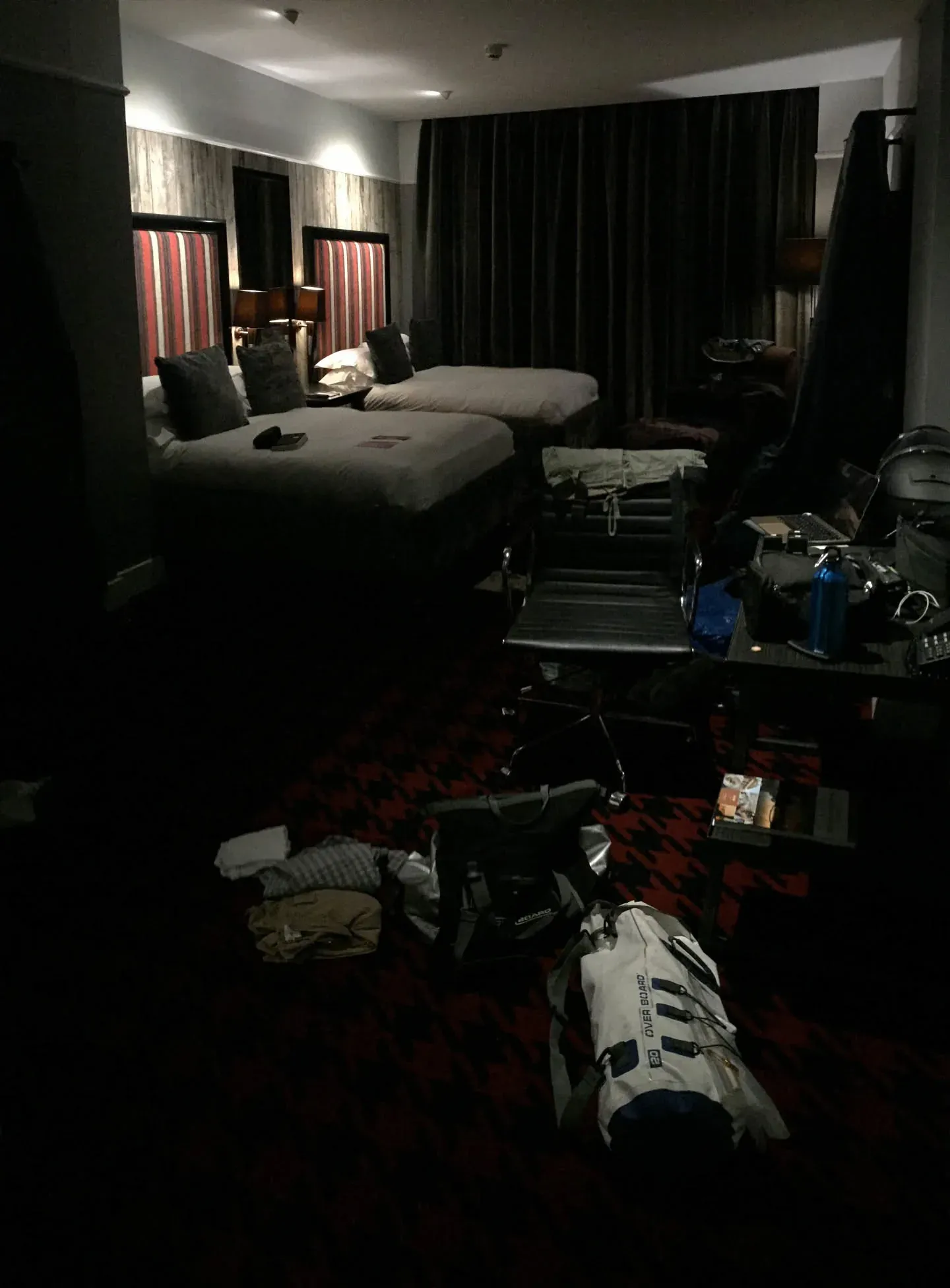 Hotel room at Battlefield with packed luggage on floor