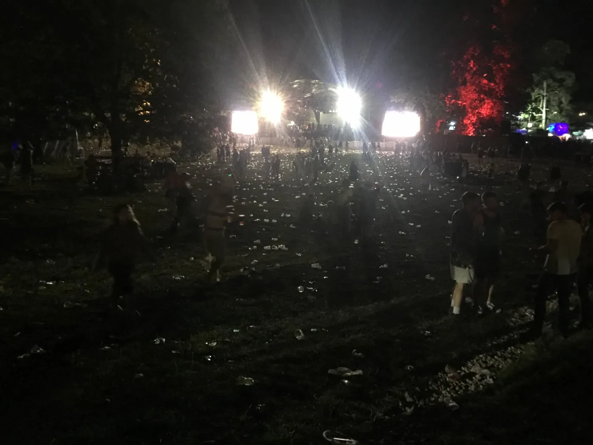 Night festival crowd at Lowther, illuminated grounds