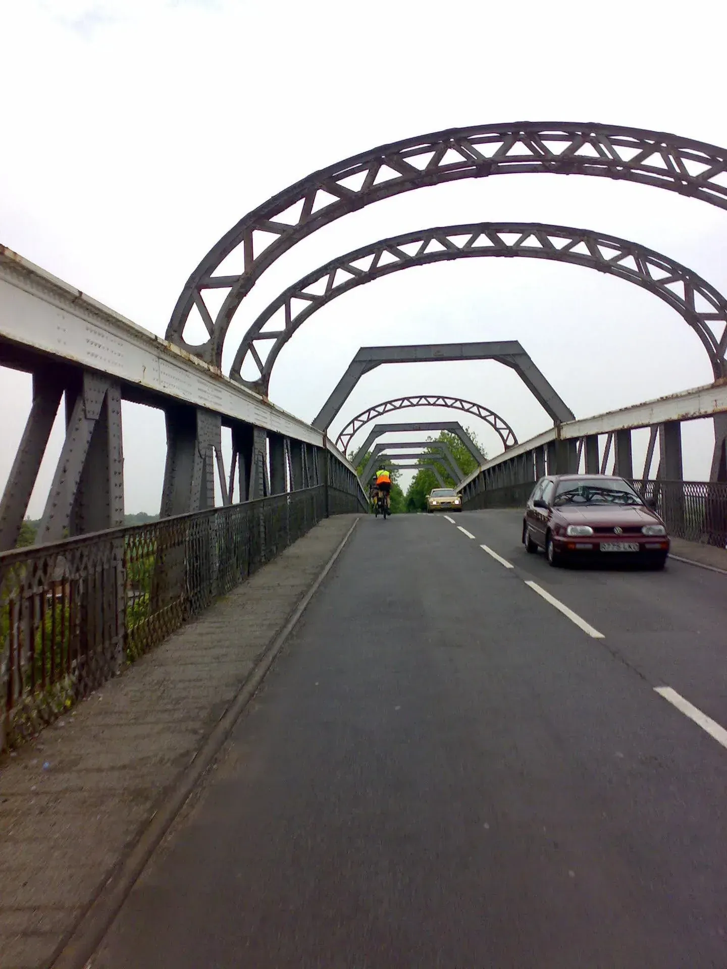 Rixton-with-Glazebrook bridge with cyclist and car traffic