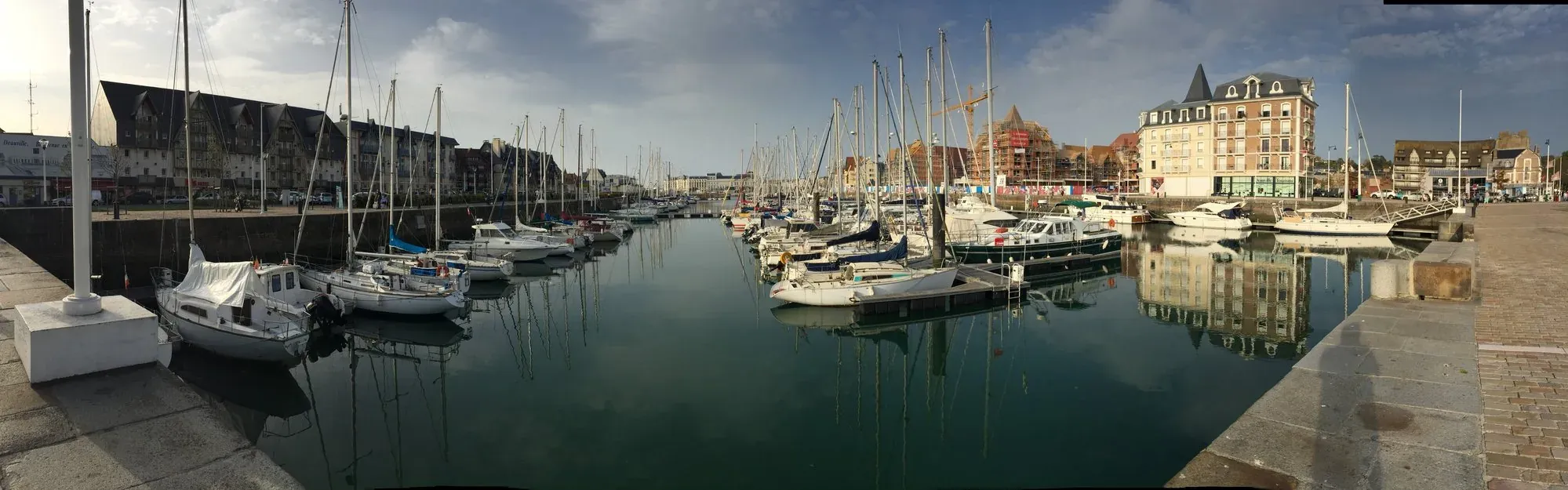 Sailboats moored in Deauville harbor, Normandy