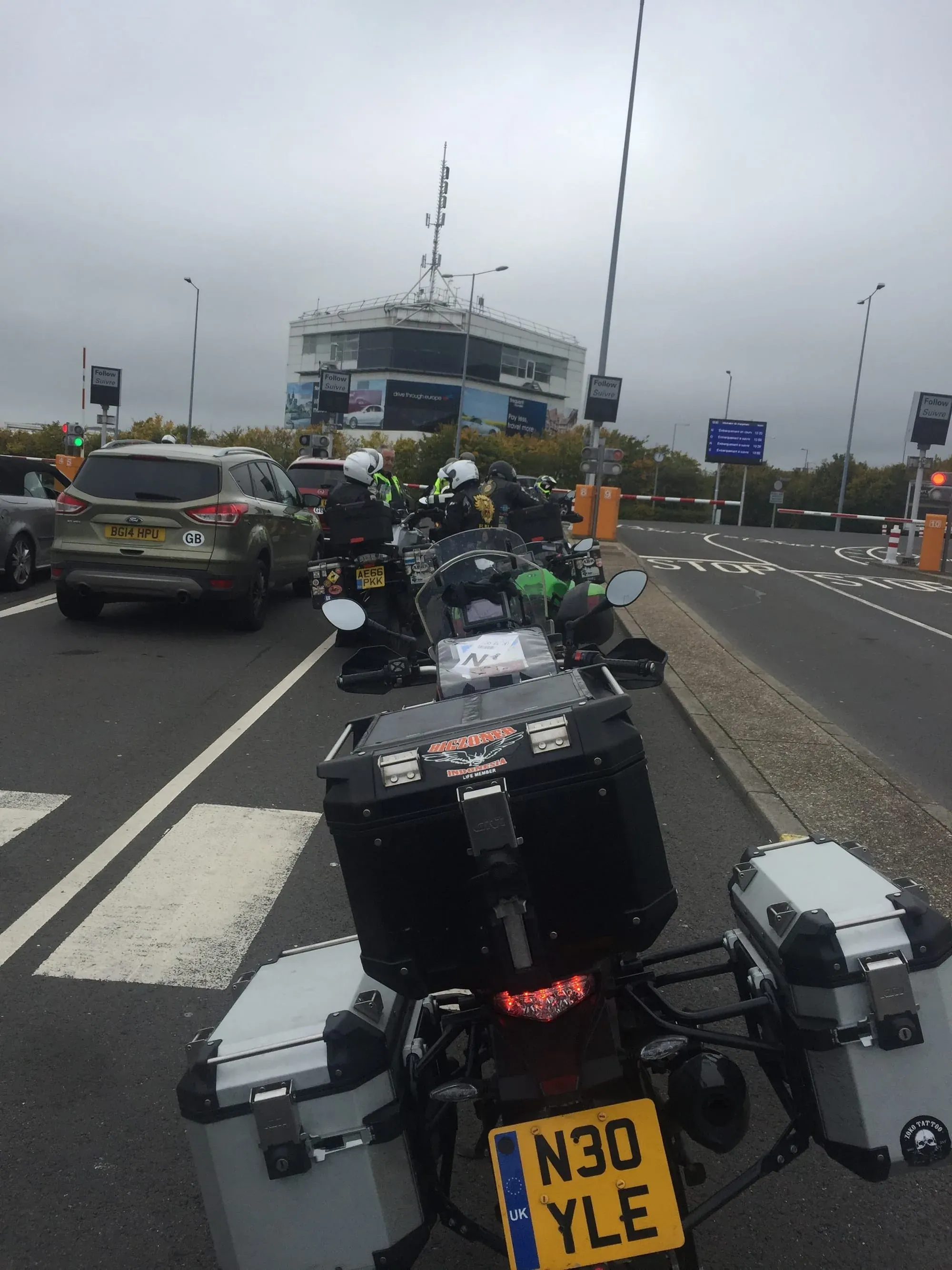 Motorcyclists at toll booth, Newington