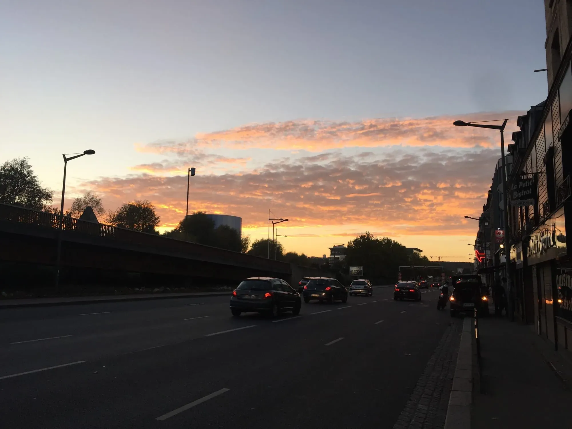 Sunset over traffic at Quartier Pasteur, Le Mans