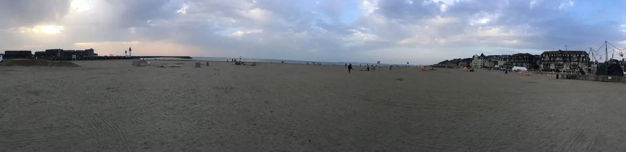 Wide beach at Trouville-sur-Mer at dusk
