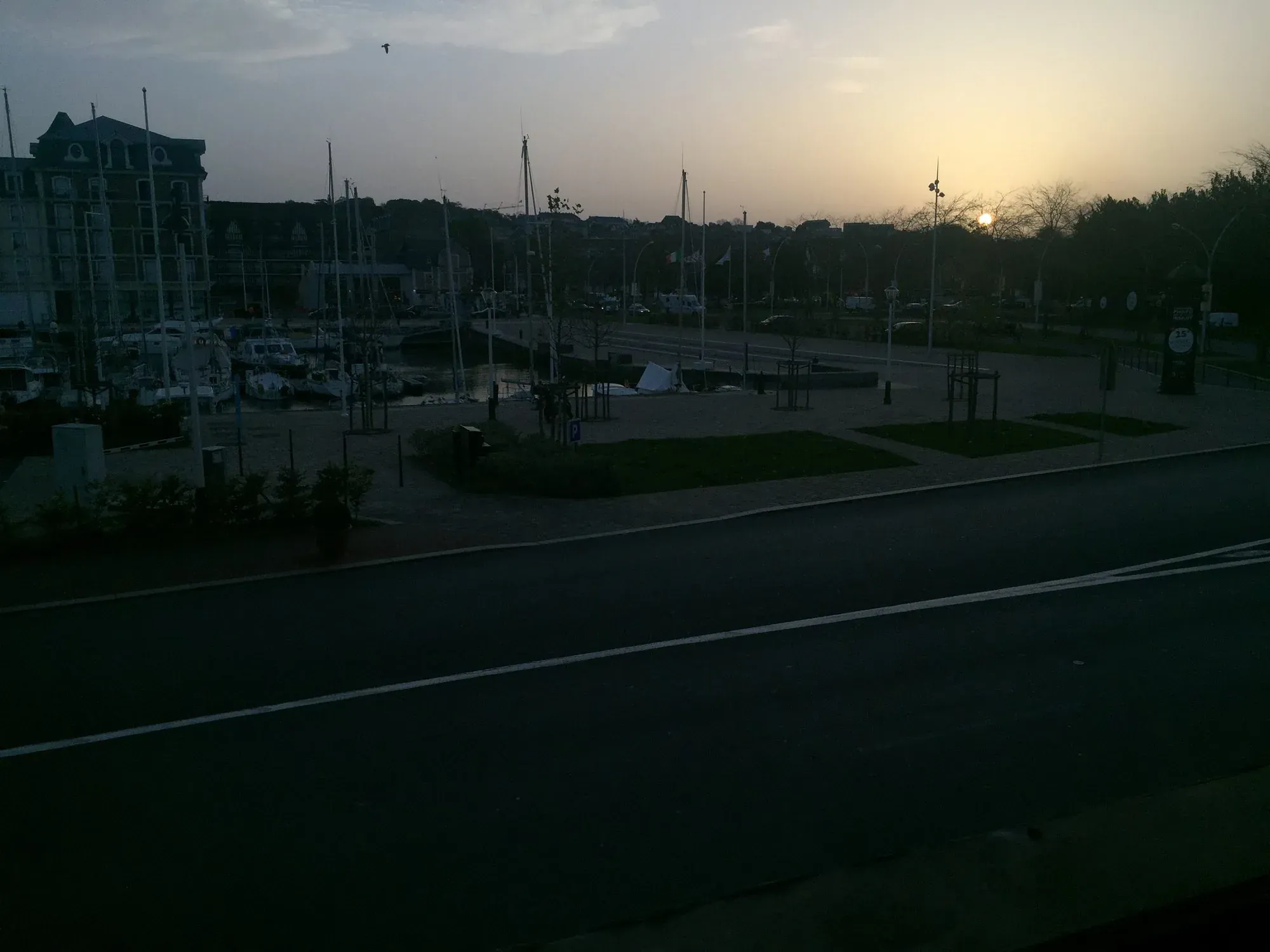 Sailboats at marina in Deauville at dusk