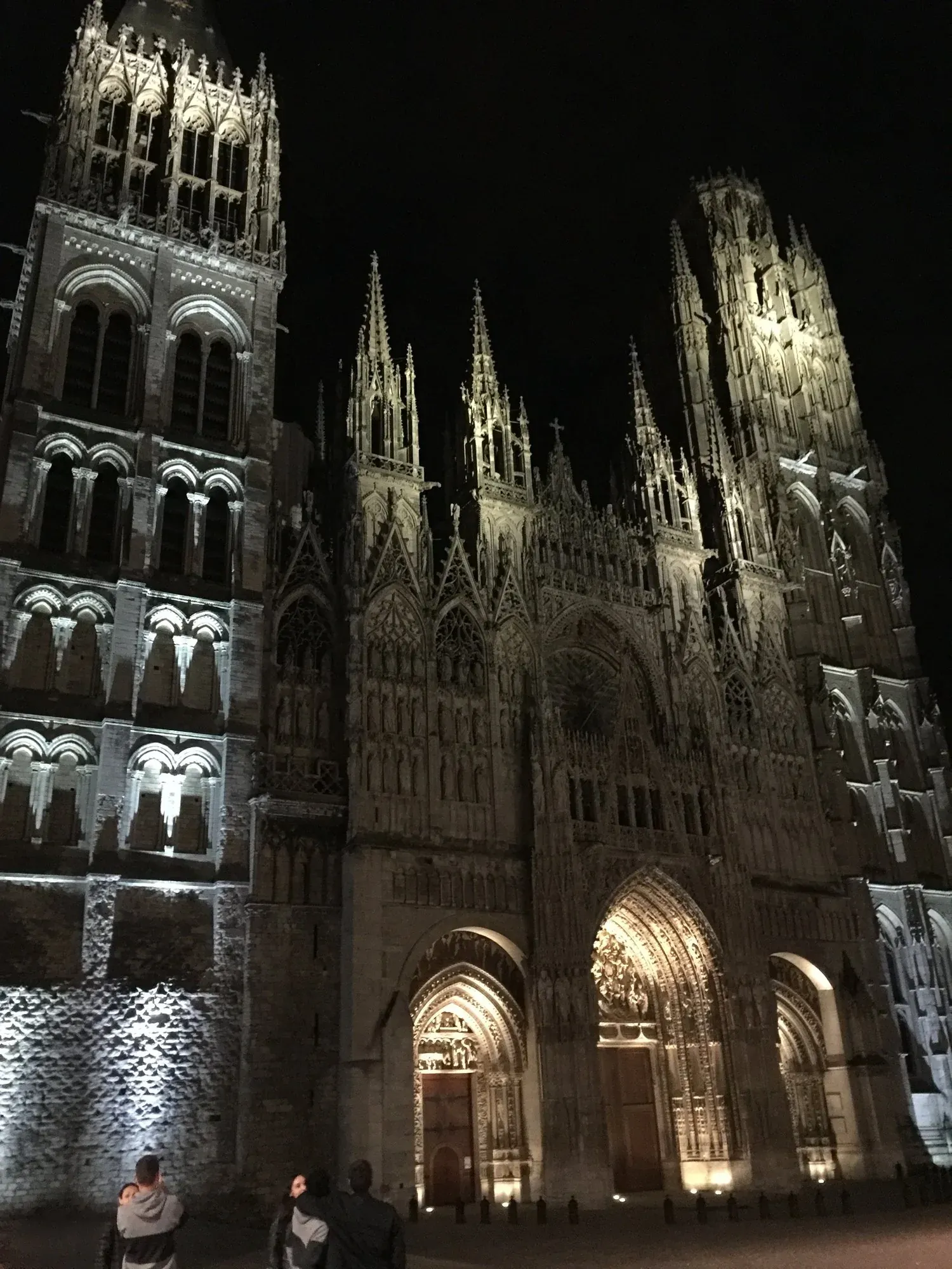 Cathedral illuminated at night in Rouen, Normandy