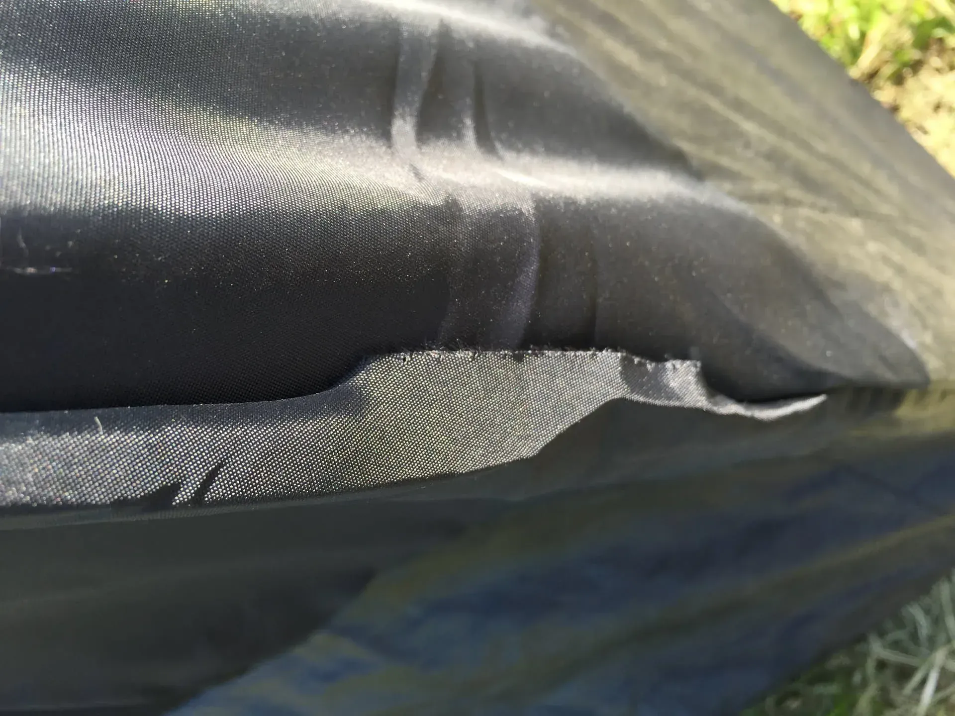 Close-up of fabric tear in Le Mans