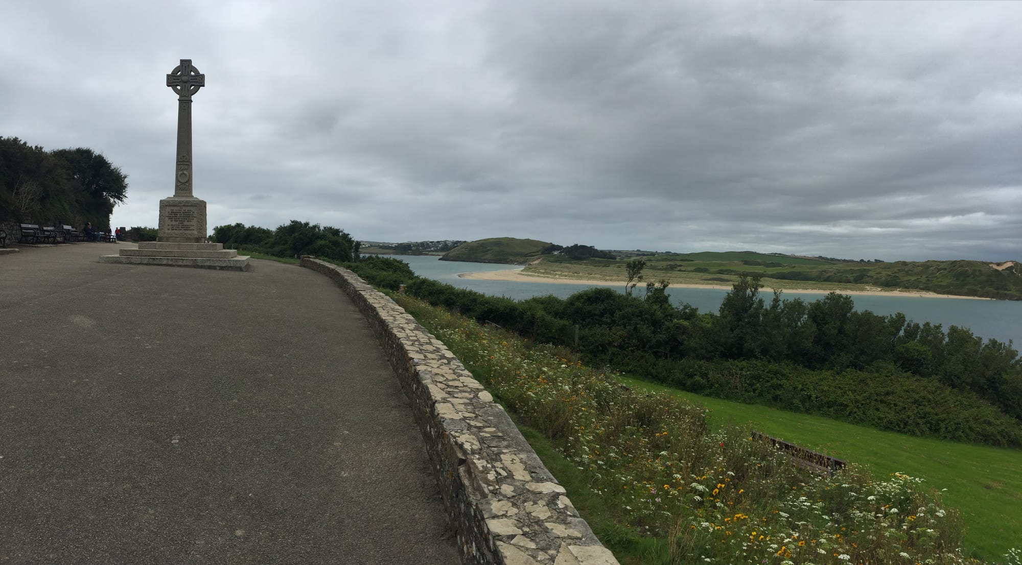 Celtic cross at Padstow overlooking river estuary