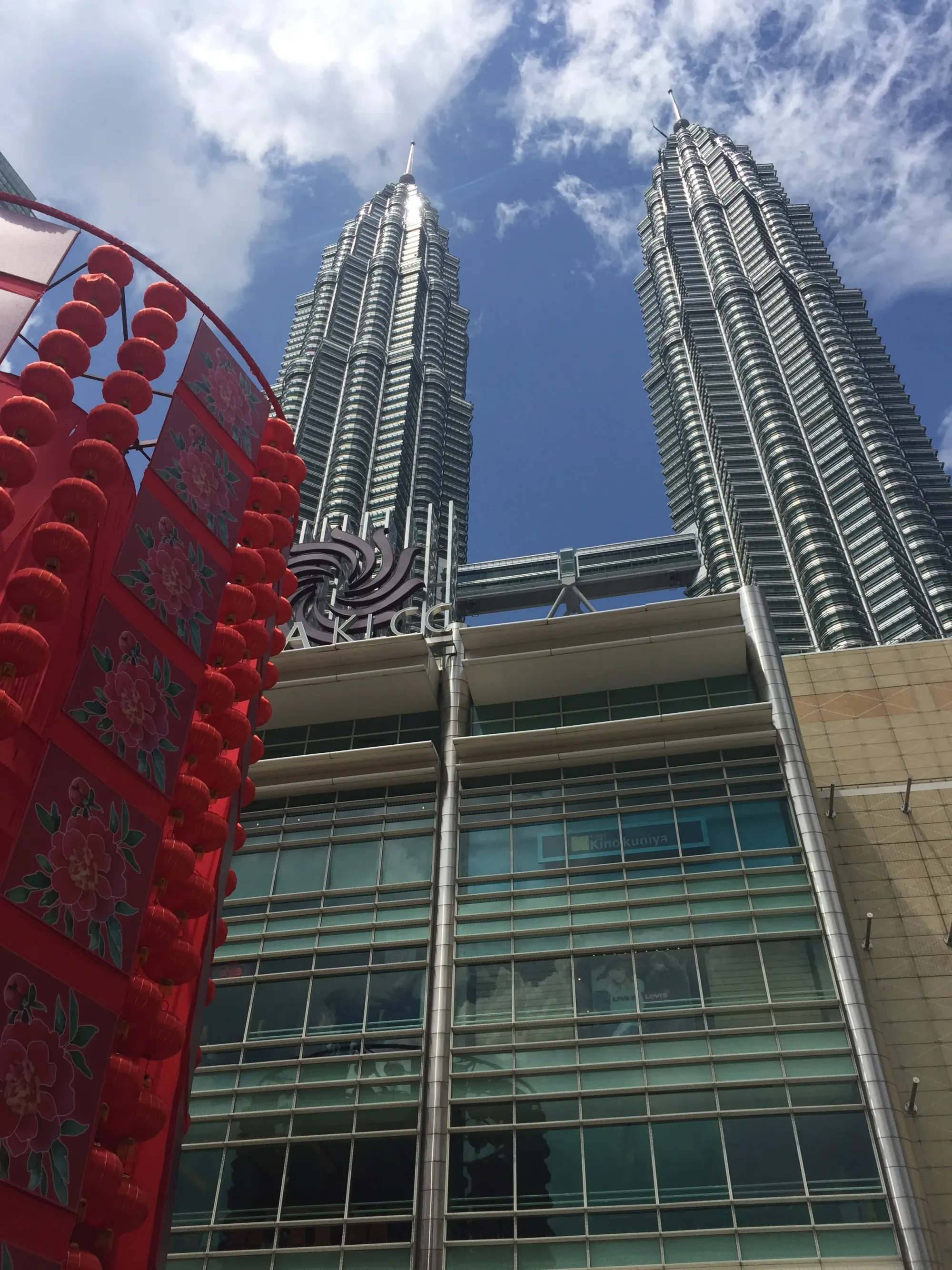 Petronas Twin Towers with red lanterns below