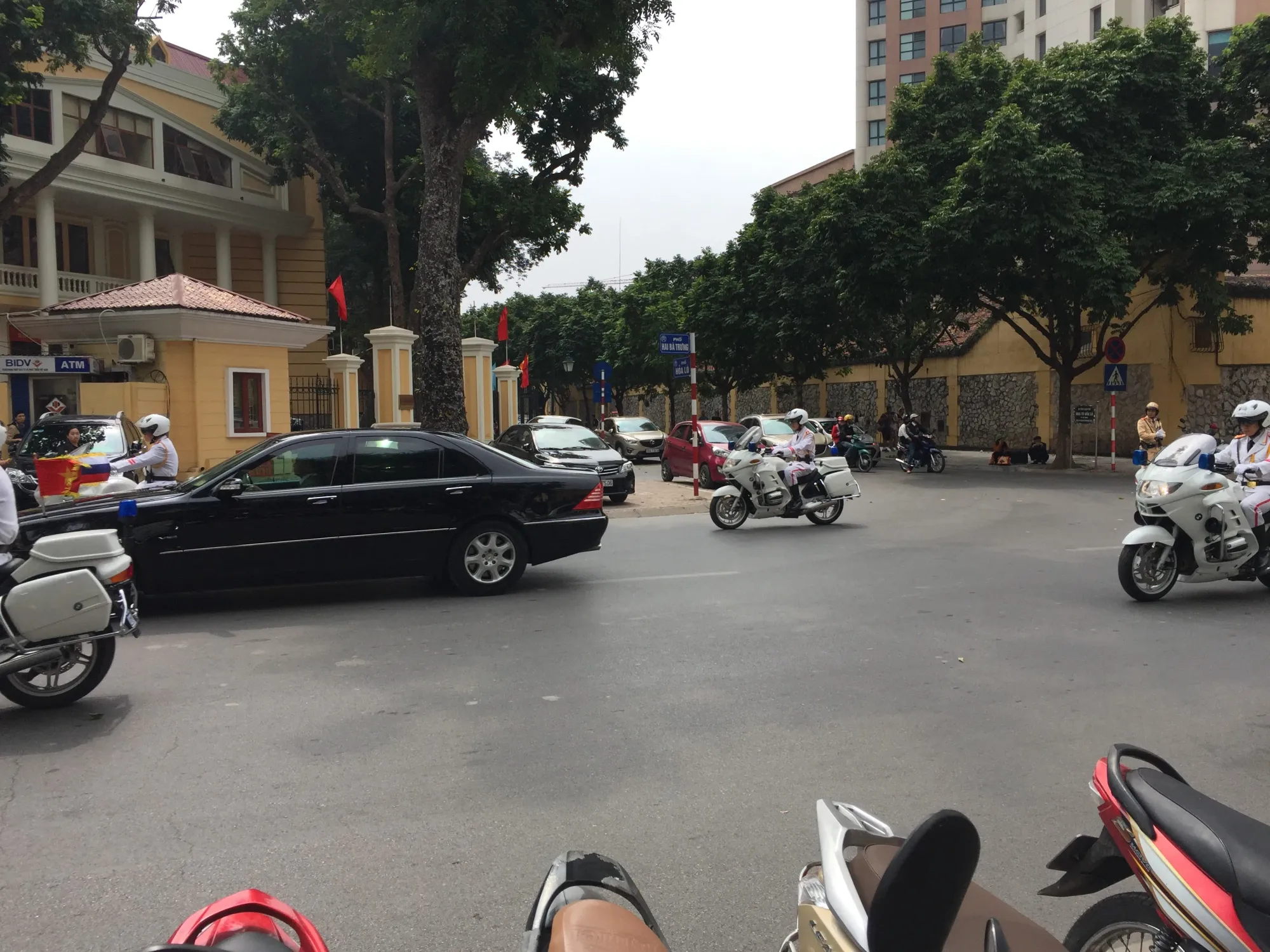 Busy street with motorcycles and cars in Vietnam