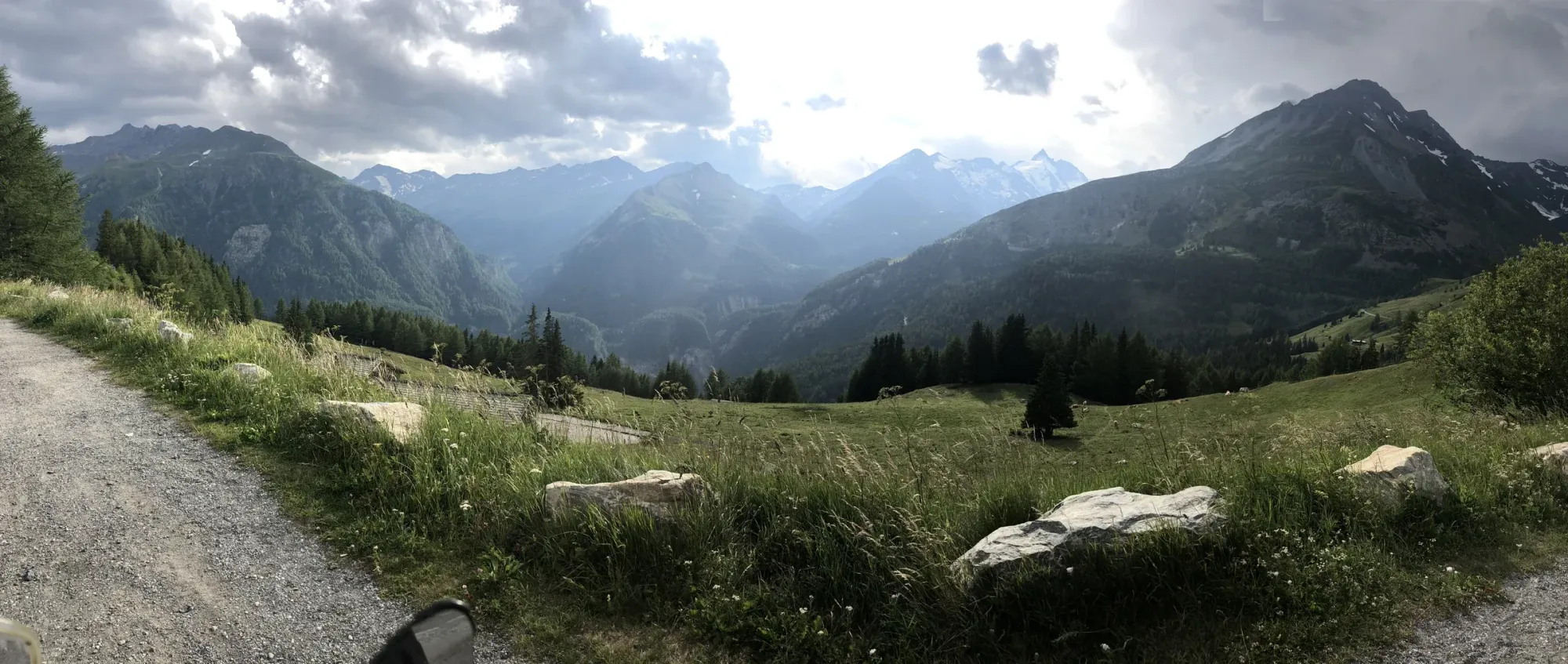 Alpine viewpoint, Austria — Großglockner approach, wildflowers and mountains.