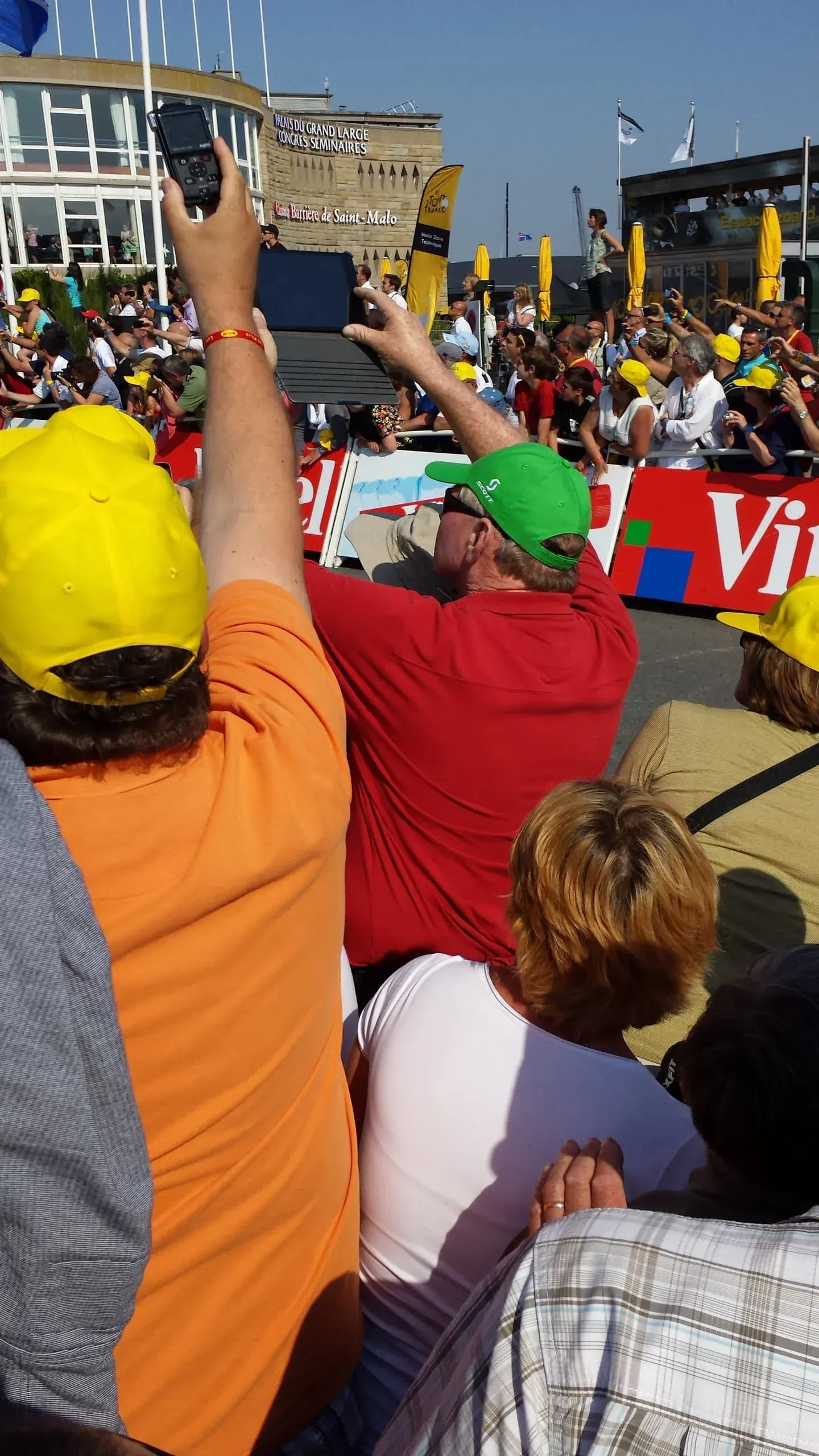 Spectators taking photos at Tour de France stage finish