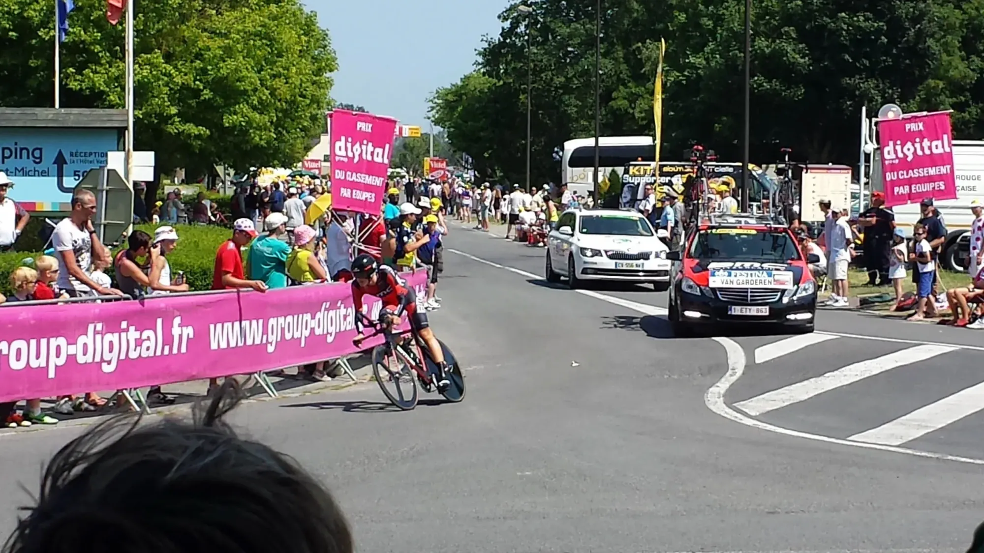 Cyclist passing through Le, Normandy during Tour de France 2013