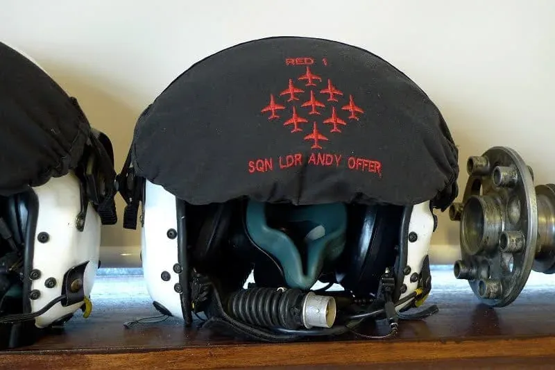 Black flight helmet with red embroidered Red Arrows design