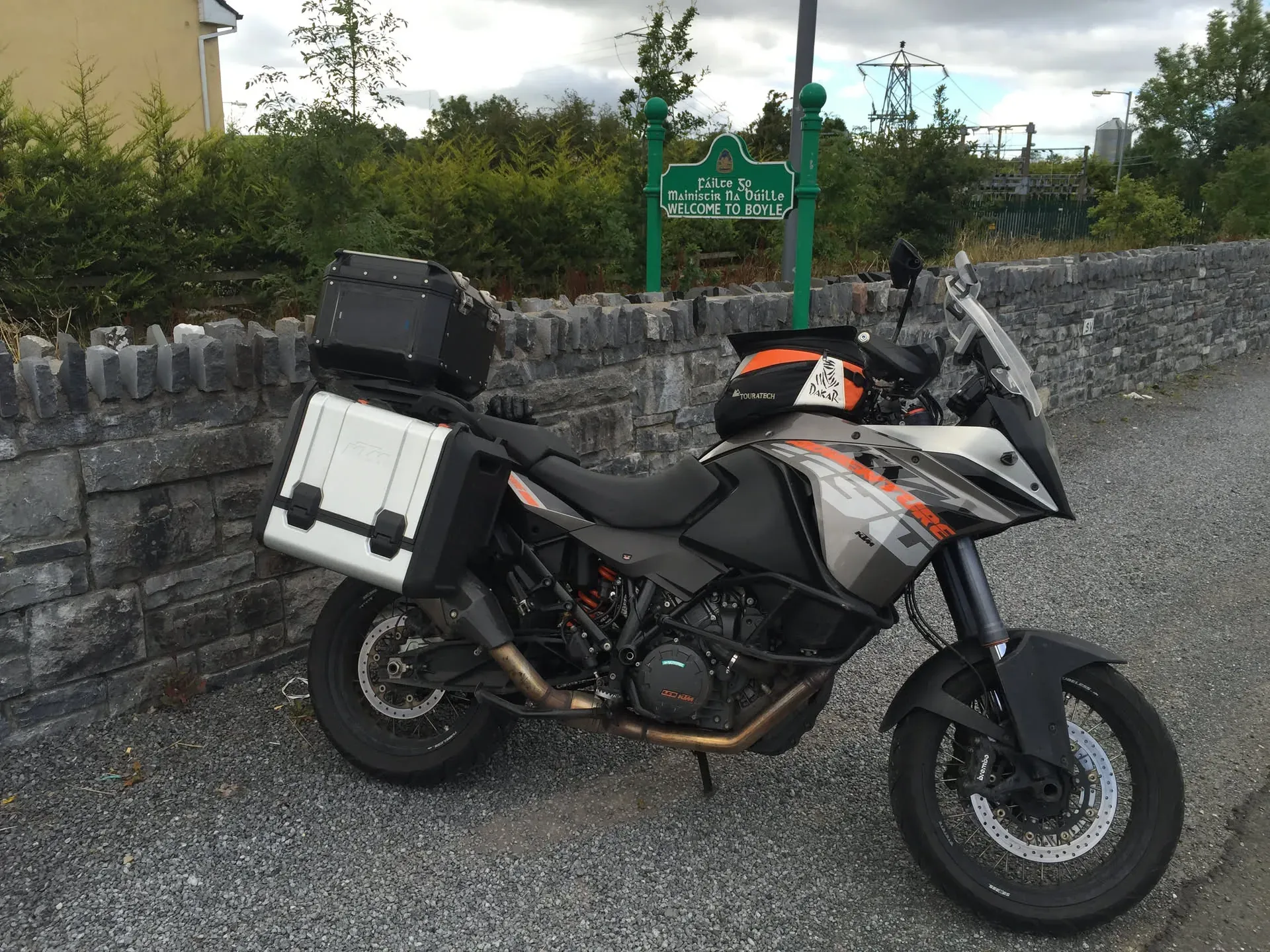 KTM adventure bike at Boyle welcome sign, Ireland