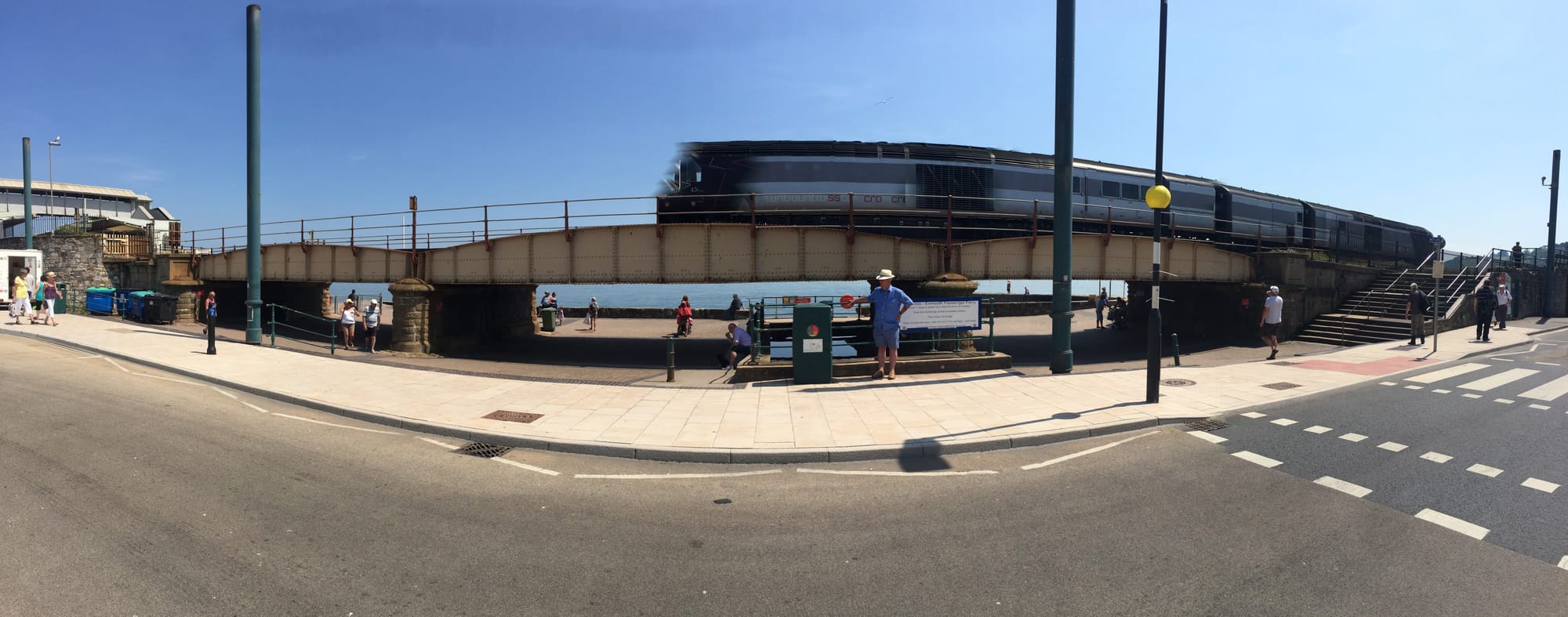 Train passing over Victorian viaduct, Dawlish seafront