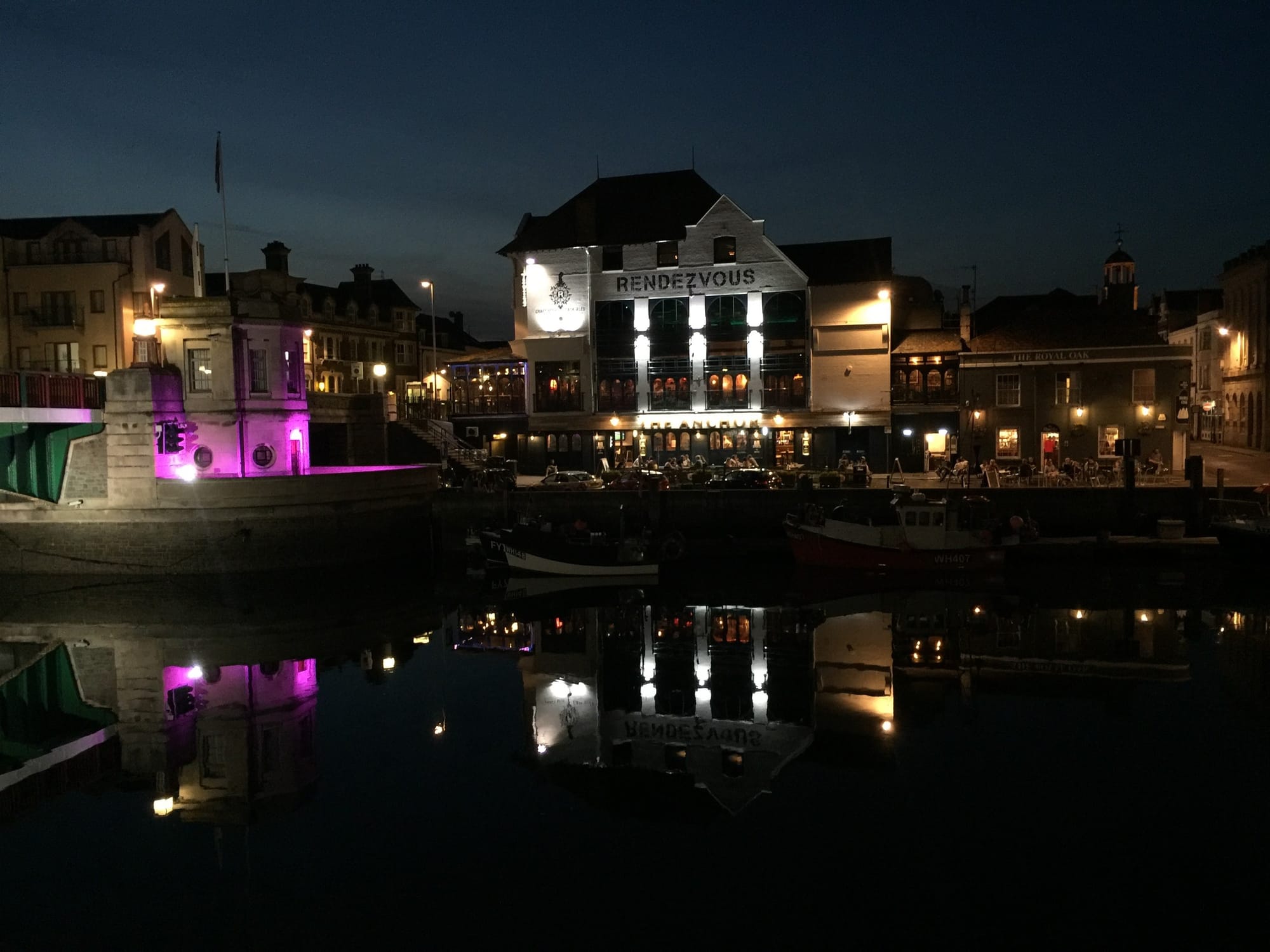 Weymouth Harbour at night, Dorset illuminated waterfront